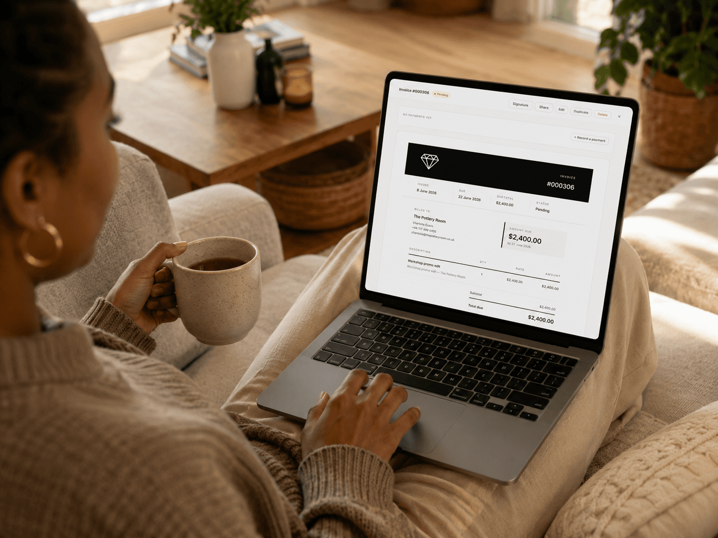 Sending a branded GíríBooks invoice from the couch on a quiet weekend